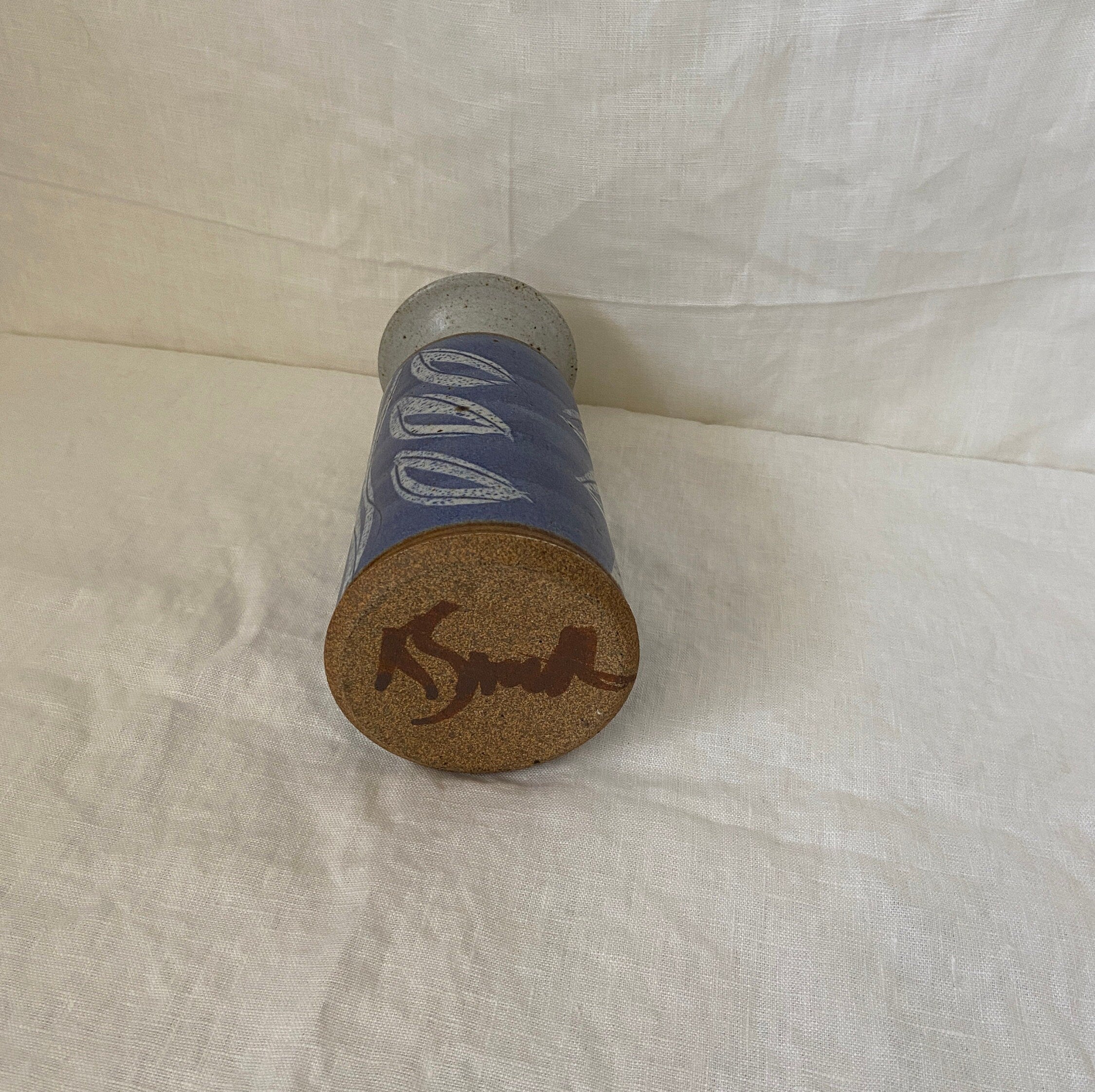 Purple ceramic vase with leaf design