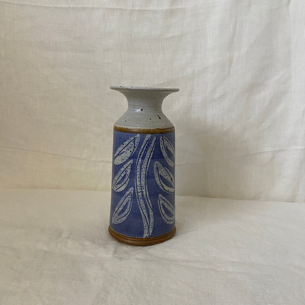Purple ceramic vase with leaf design